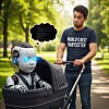 Man pushes a stroller with a glowing humanoid robot in it on a tree-lined path.
