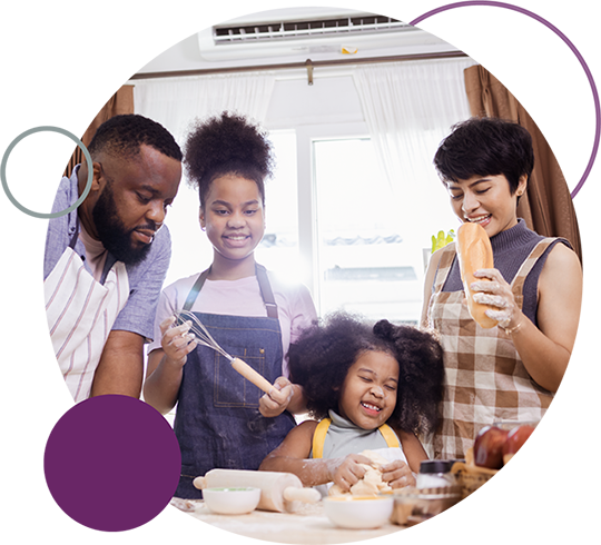 Family making dinner together after using the myfortiva credit card