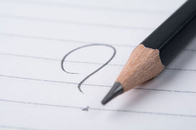 question mark written on paper